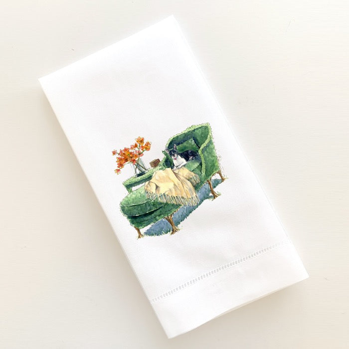 Boston Terrier dog portrait on a topiary chaise lounge with orchid arrangement