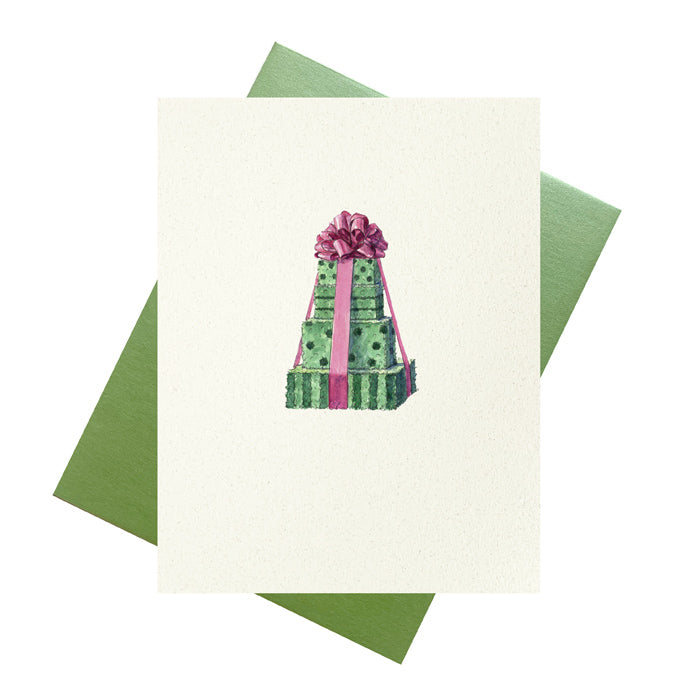 Stack of topiary presents tied in bow birthday card.