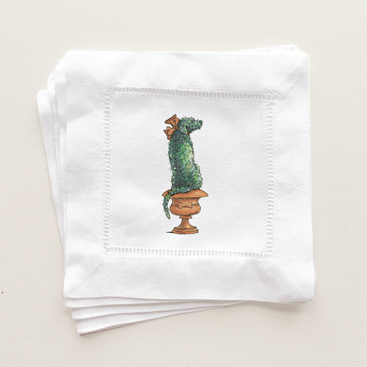 Retriever shaped topiary in pot with dog bone detail printed on cocktail napkins