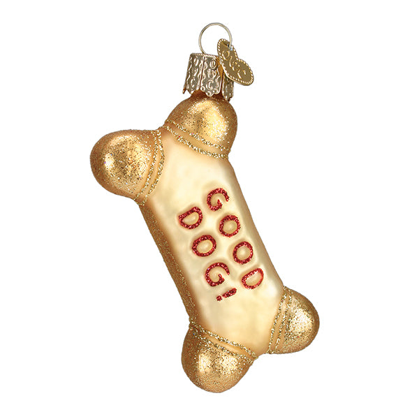 A gold dog treat christmas tree ornament.
