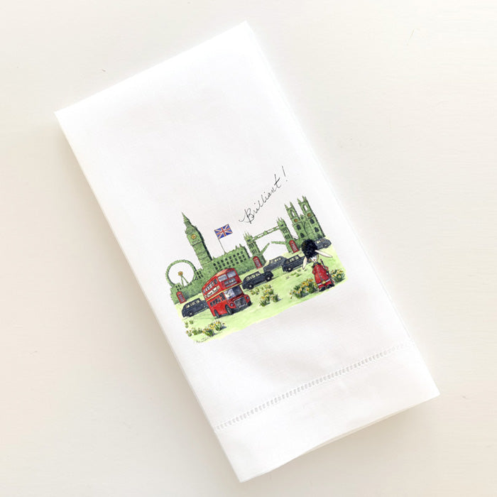 Topiary hedge skyline of London landmarks with taxis, double decker bus and beefeater bunny printed on linen guest towel