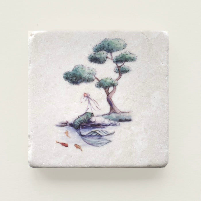 Merbunny with topiary cloud printed on a tumbled marble coaster.