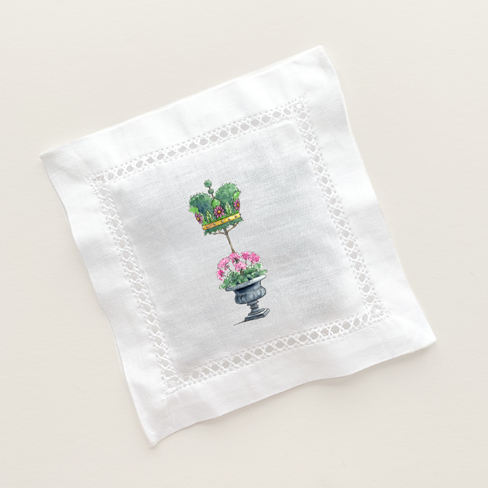 Hemstitched linen filled with lavender buds and printed with topiary crown design.