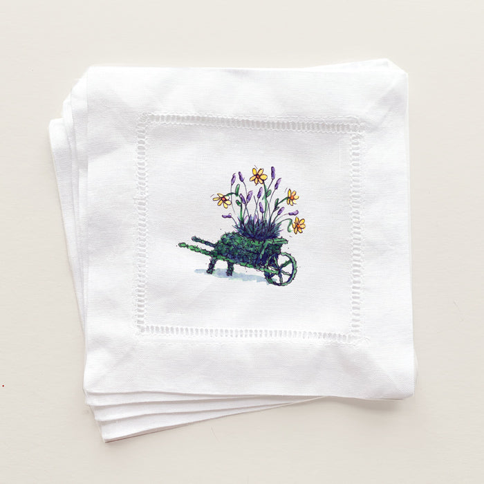 Whimsical topiary wheelbarrow with yellow and purple flowers printed on beautiful Linen Cocktail Napkins 