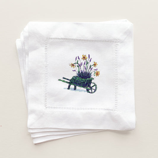 Whimsical topiary wheelbarrow with yellow and purple flowers printed on beautiful Linen Cocktail Napkins 